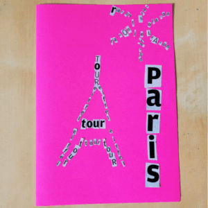 Carte postale rose avec Tour Eiffel, soleil et Paris dessinés avec des lettres coupées dans du papier journal