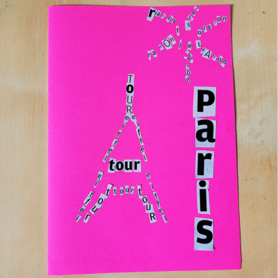 Carte postale rose avec Tour Eiffel, soleil et Paris dessinés avec des lettres coupées dans du papier journal