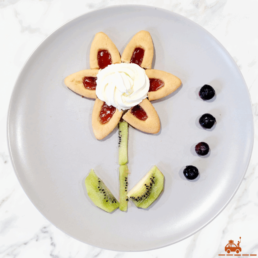 Fleur en crème chantilly barquettes et kiwi