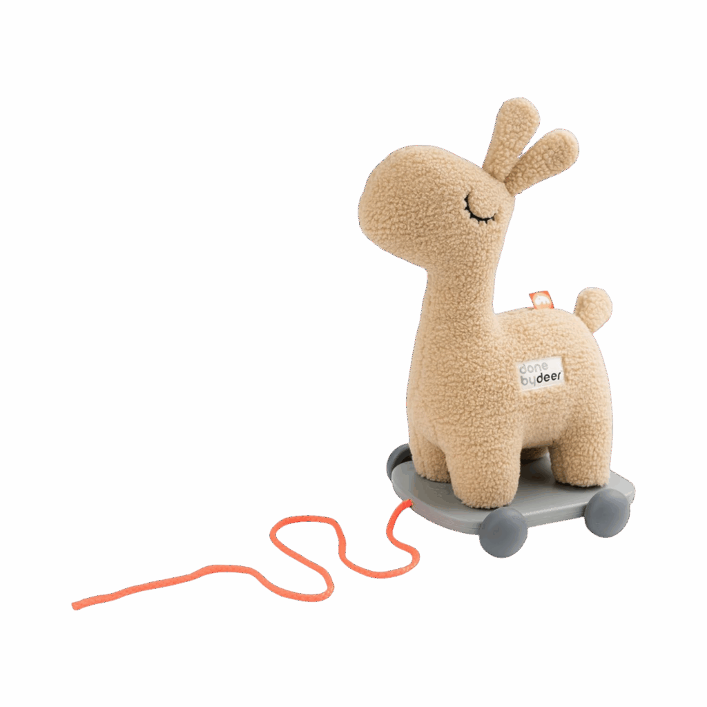 Jouet d'éveil bébé Done By Deer : une peluche de lama à tirer