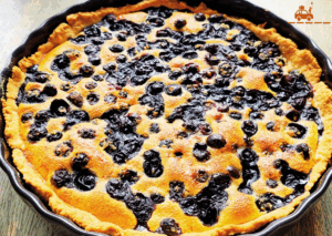 Tarte aux myrtilles sauvages réalisée avec des myrtilles cueillis lors d'une randonnée en montagne