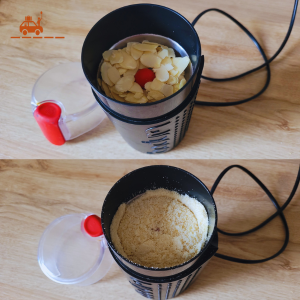 Moulin à café contenant des amandes effilées à moudre pour obtenir une poudre d'amande bien fine.